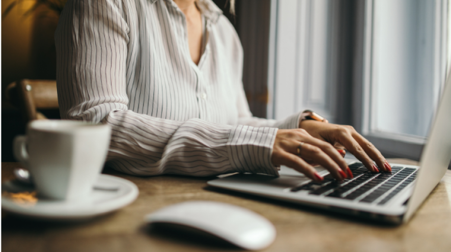 woman typing on computer