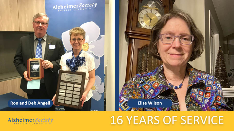Ron and Deb Angell holding awards in front of an Alzheimer Society of BC and Yukon banner, alongside Elise Wilson at home, celebrating 16 years of volunteer service.