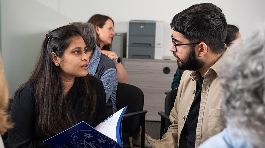 two participants discussing in workshop