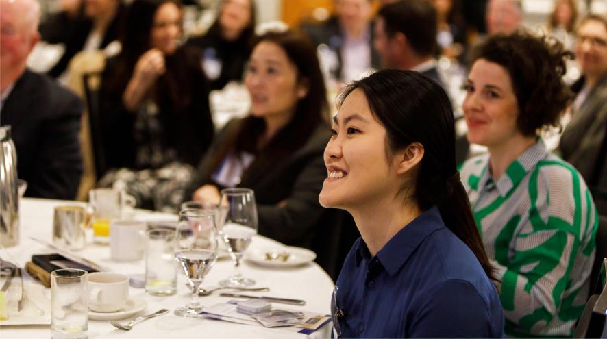 Breakfast to remember event participant smiling.