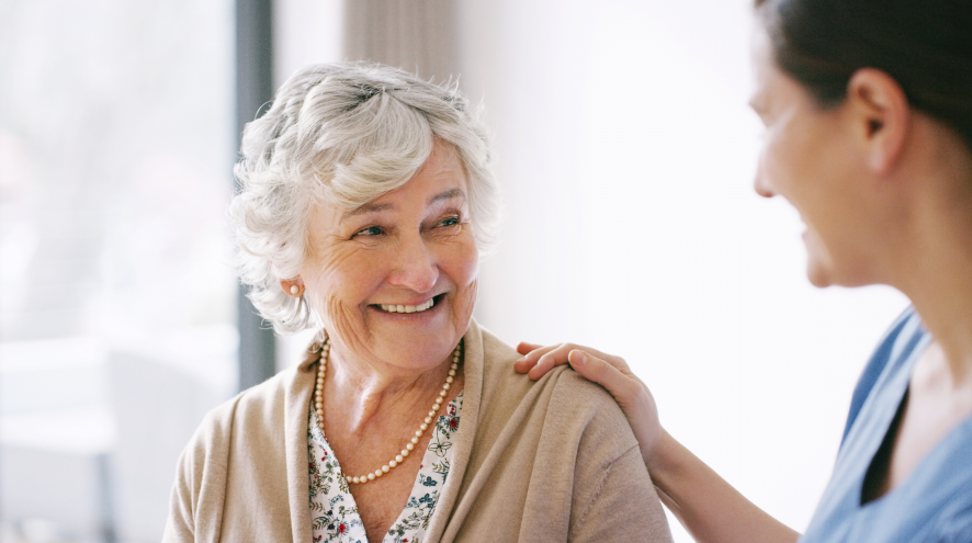 Senior woman smiling at her doctor's office.