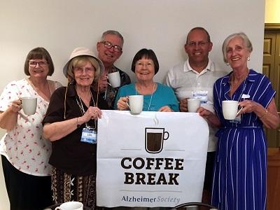 ASNR Advisory group holding a coffee break banner