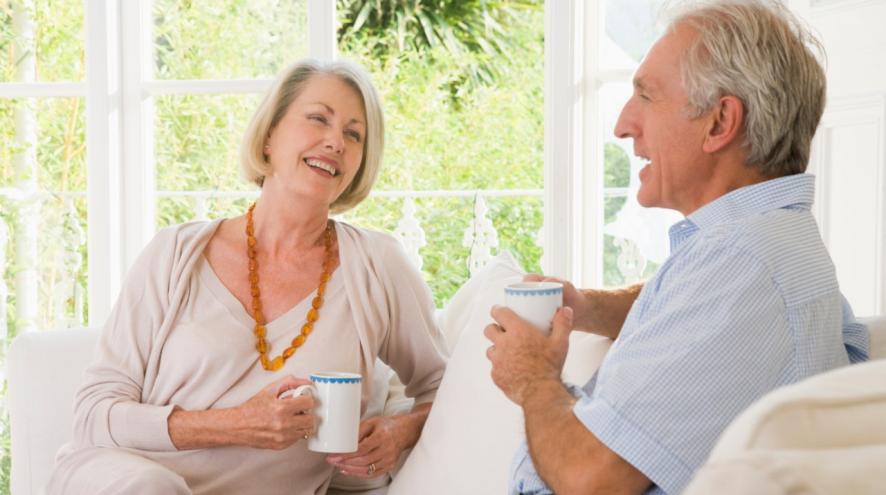 Senior couple enjoying a cup of coffee.