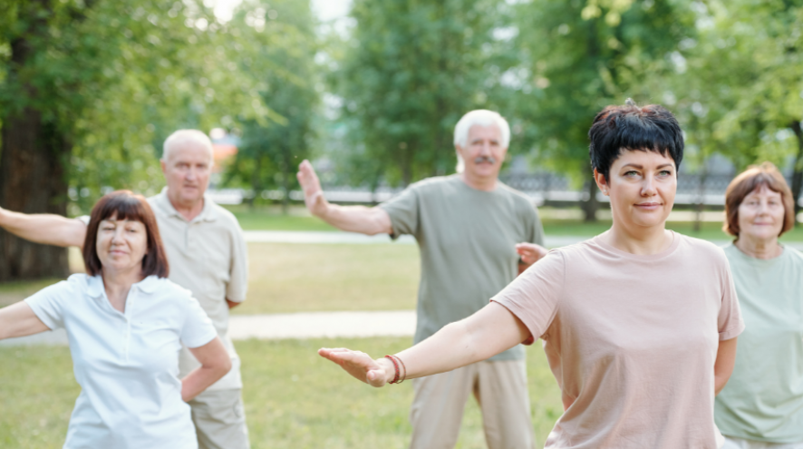 People practicing Qigong in a park