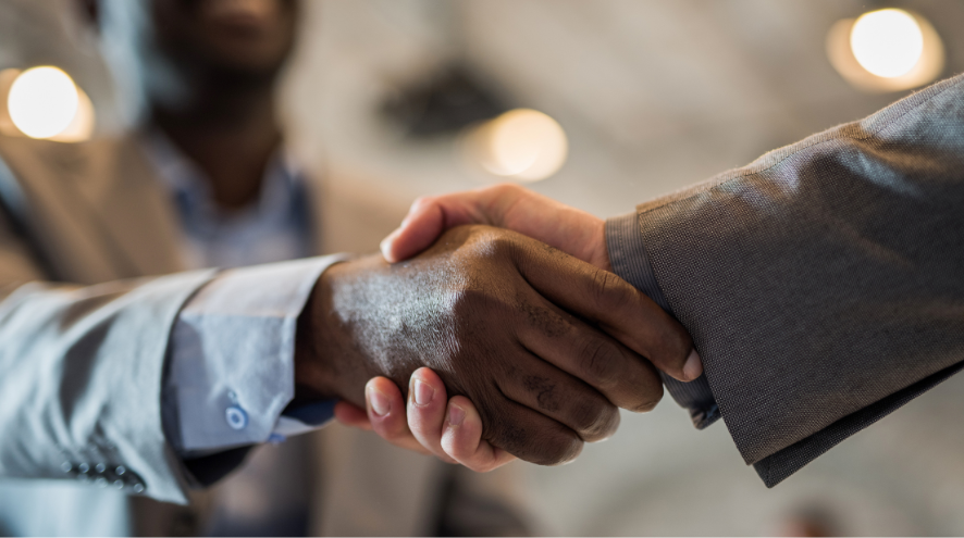 Two people shaking hands