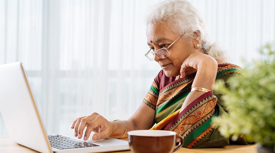 Woman looking at her laptop