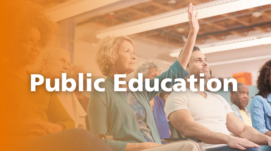 A woman raises her hand among a group of audience members with the text reading "Public education" over top.