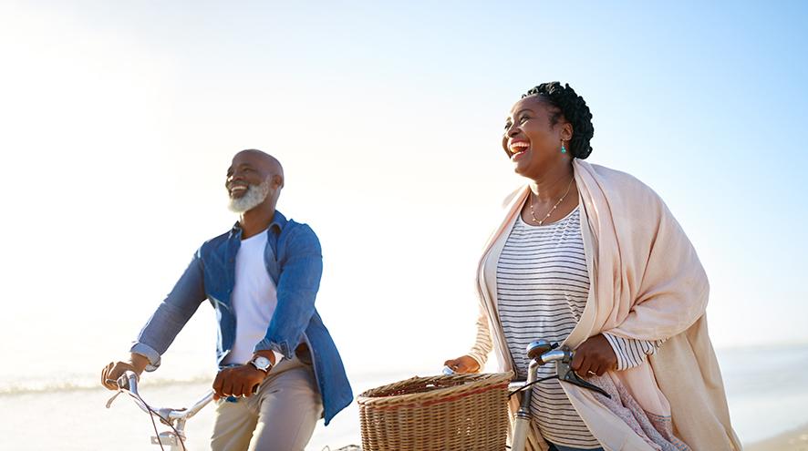 Senior couple biking together