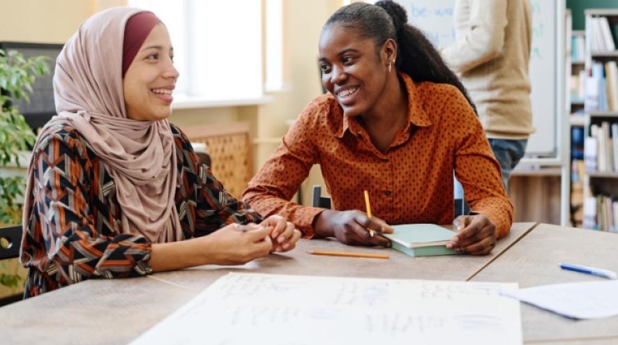 Two women smiling