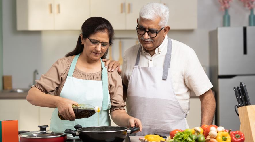 Senior couple cooking together 