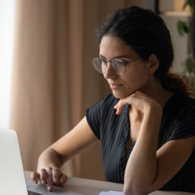 Woman looking at a laptop