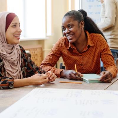 Two women smiling 