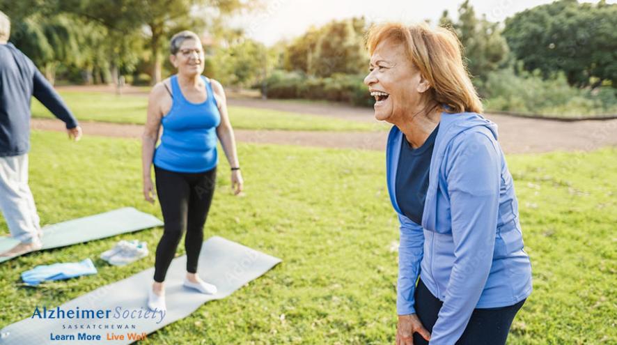 people outdoors exercising