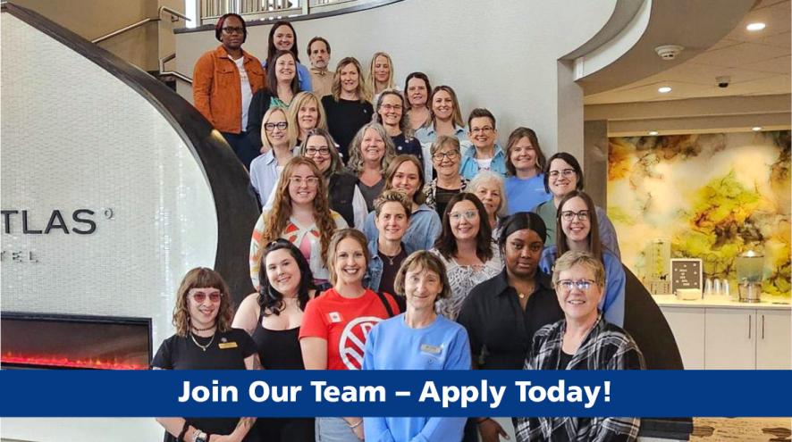 Alzheimer Society of Saskatchewan staff are gathered on a large staircase. There is text that says, "Join Our Team - Apply Today!"