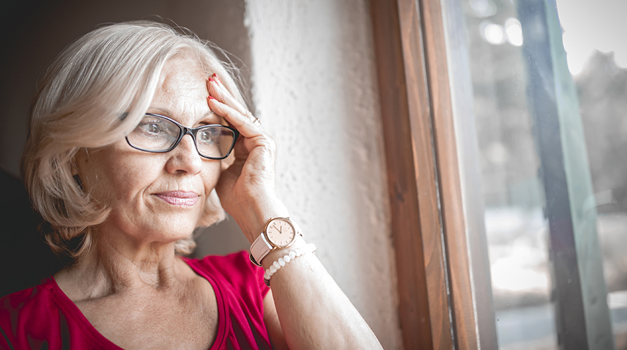 Senior woman thinking, looking concerned.